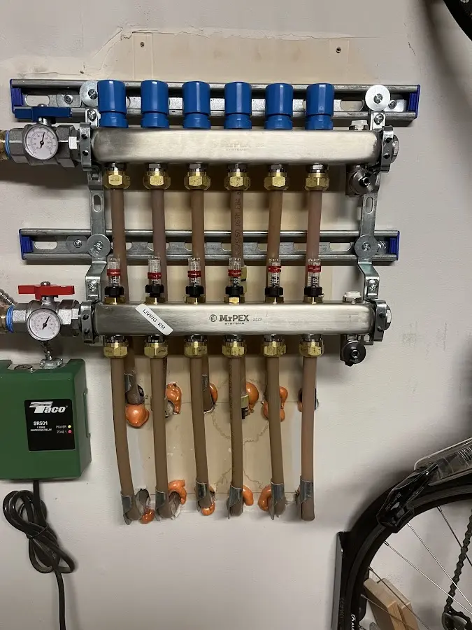 Plumber performing Water Heater Repair at a residential property in North St. Paul